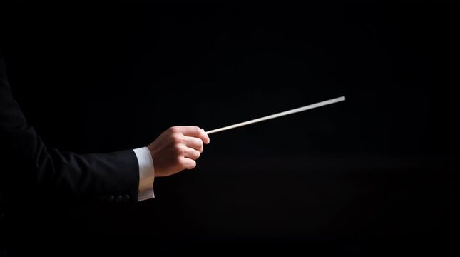 Band director, a leader, with a conductor's baton