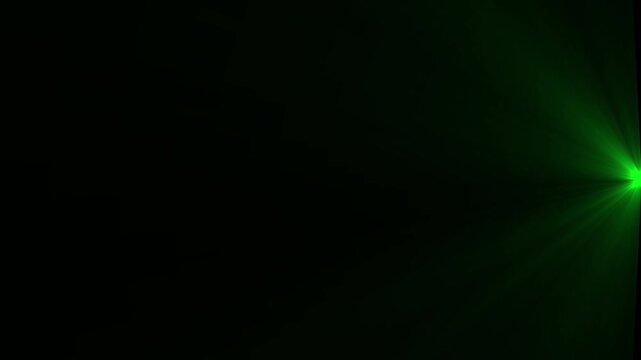 A vibrant green light flare emanates from the right corner of a predominantly dark background