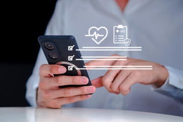 Person using smartphone to manage digital health checklist with medical icons, representing telemedicine, health monitoring, patient data tracking, and mobile healthcare technology lifestyle