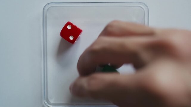 Rolling Three Red Yellow and Green Dice on Transparent Square Tray