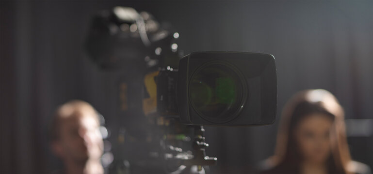 Cinematic film equipment preparing for interview in studio with copy space