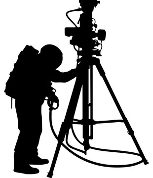 Silhouette of a Professional Cameraman Operating a Broadcast Video Camera on a Tripod