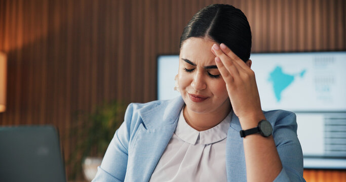 Business, woman and headache with laptop in office for data mistake, modeling error and workload. Graphs, financial analyst and overwhelmed with tech for metrics inconsistency, stress and brain fog