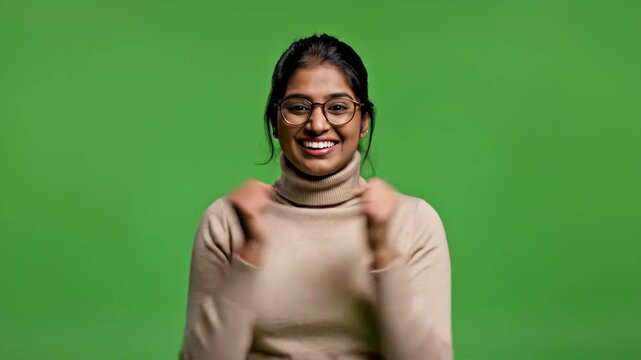Surprised Woman with Hand Covering Mouth in Front of Green Screen