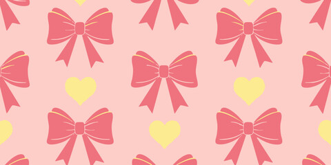 Obraz premium A vibrant pattern of pink bows and yellow hearts on a soft pink background