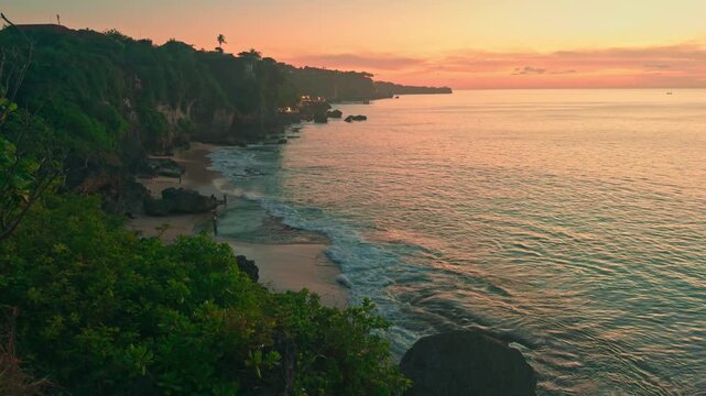 Tropical summer beach, sunrise over sea horizon, waves and beach shore video