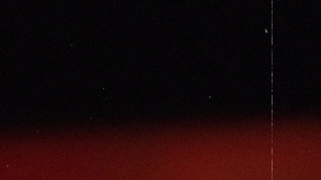 Vintage Film Dust Overlay with Warm Light Leak Motion. 4K Video