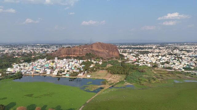 4K Aerial drone view of Madurai city landscape with prominent rock formations, Tamil Nadu, South India.