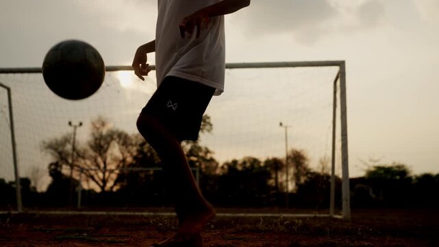 Young boy celebrating scoring goal on soccer field, expressing success and achievement. Concept of victory, winning moment, happiness, and sports motivation in cinematic style.