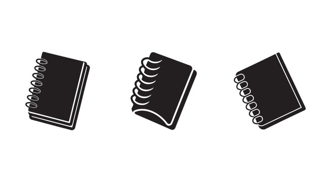 Three spiral bound notepads in different orientations on white background