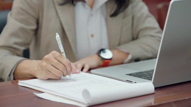 Corporate lawyer analyzing documents and preparing legal strategy for business. Concept of legal consultation, corporate governance, and professional advisory services.