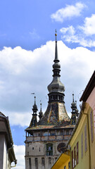 Obraz premium The Clock Tower in Sighisoara, one of the main tourist attractions in this medieval town in Transylvania.