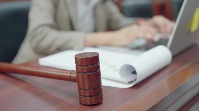 Judge gavel symbolizing final court decision and legal verdict. Concept of justice system, fairness, law enforcement, and judicial authority in professional setting.