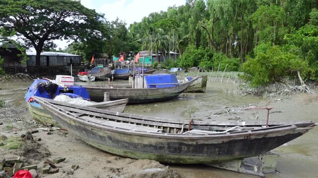 After the tide recedes, there are some abandoned fishing boats are view in the Dhal Char ghat at southernmost island of Bhola district.