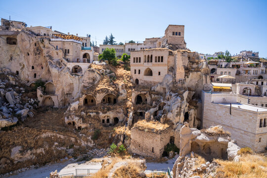 Modern houses among antique ruins. Ortahisar town in Cappadocia, Turkey.