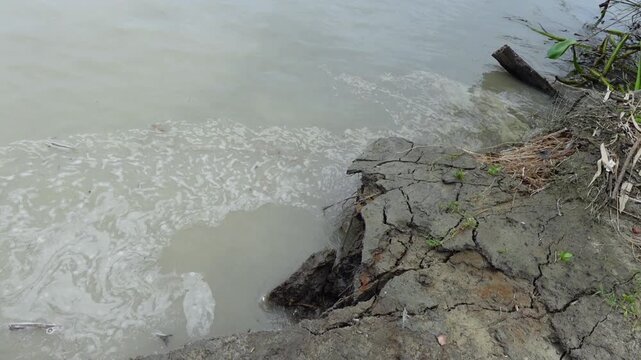 A closeup view of river erosion on a remote riverbank in Dhalchar, Bhola district.