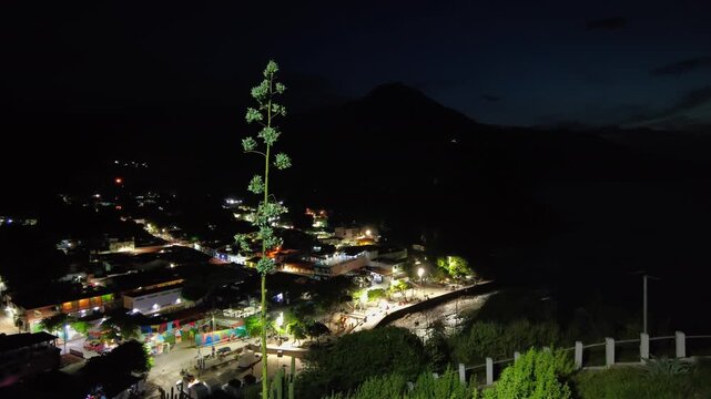 A panoramic view of the town of Choroni at night, seen from a high vantage point along the boardwalk, Aragua, Venezuela