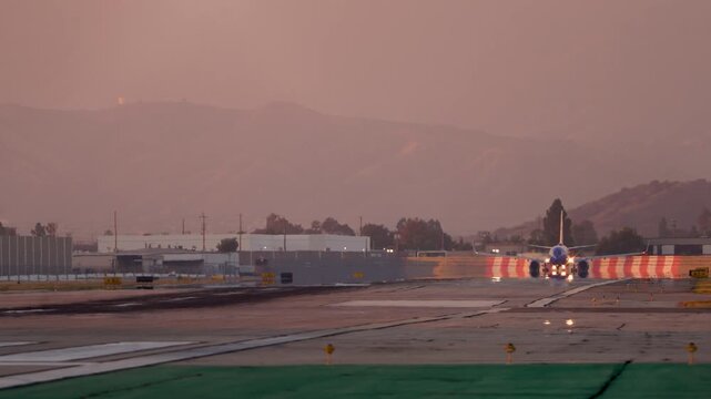 Airplane Takes Off Head on View from Runway