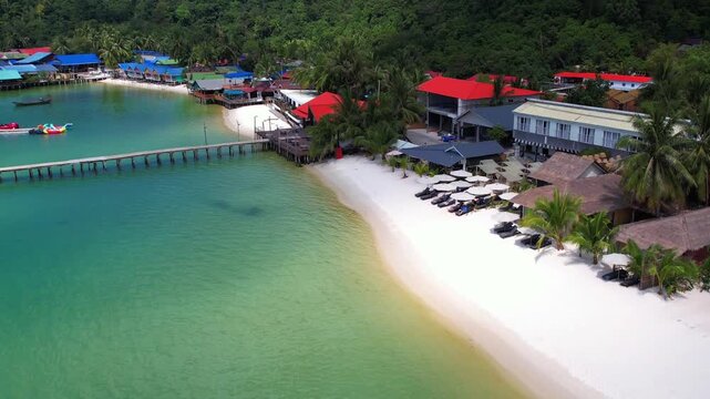 Cambodia | Koh Rong | Sok San | paradise beach with powder white sands, crystal clear waters, and a little town. 