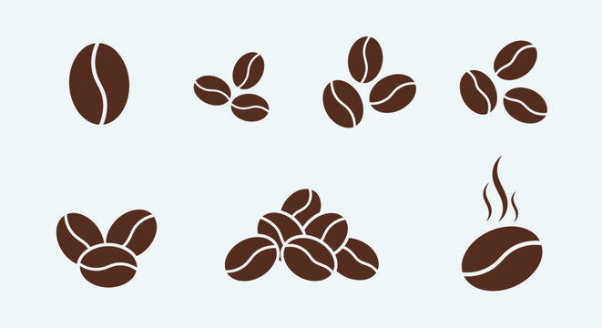 Different Arrangements of Roasted Coffee Beans with Steam on a Light Blue Background
