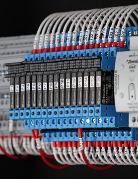 Ultra-thin intermediate Finder relays with connection terminal block in the electrical control panel. 