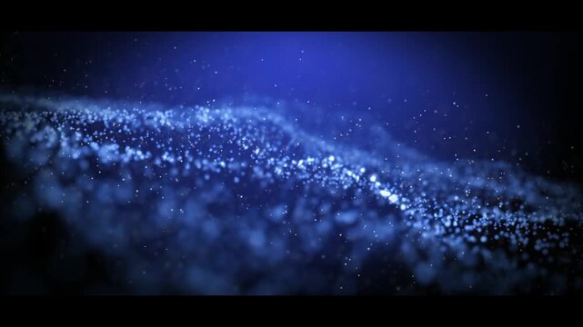 Technology digital wave background concept. Beautiful motion waving dots texture with glowing defocused particles. Blue Cinematic background