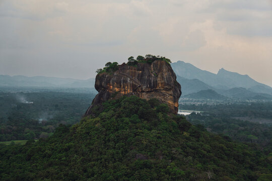 Sigiriya Lion Rock rises above tropical forest in Sri Lanka