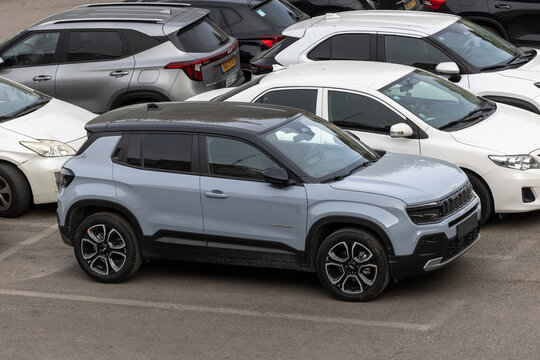 Jeep Avenger compact suv parked among cars in parking lot top view. 12 Feb 2026. Givatayim, Israel