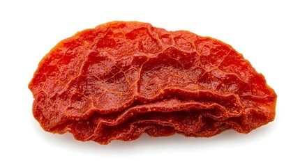 Obraz premium Close-up of a single dried goji berry isolated on white background.