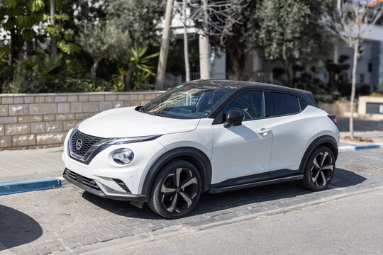 Nissan juke compact suv parked on residential street. 22 Feb 2026. Givatayim, Israel