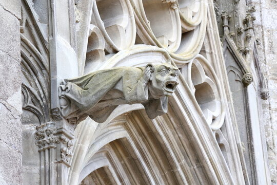 Details of Carcassone Cathedral, France.  Screaming gargoyle. 