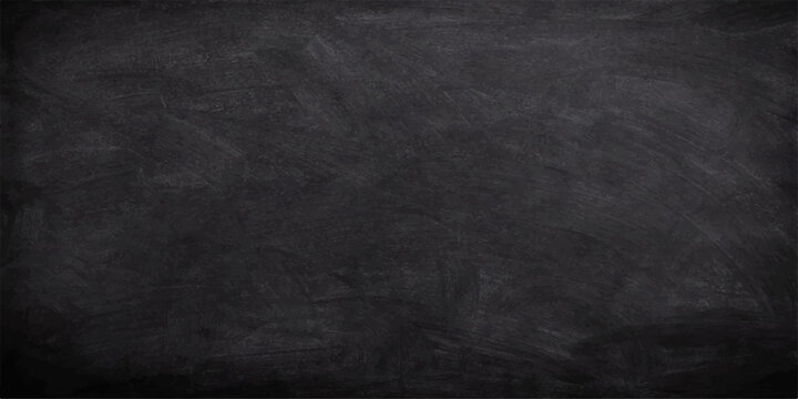A blank vintage blackboard with a dirty grunge texture and chalk dust on a dark gray surface creates an empty old chalkboard backdrop for your design