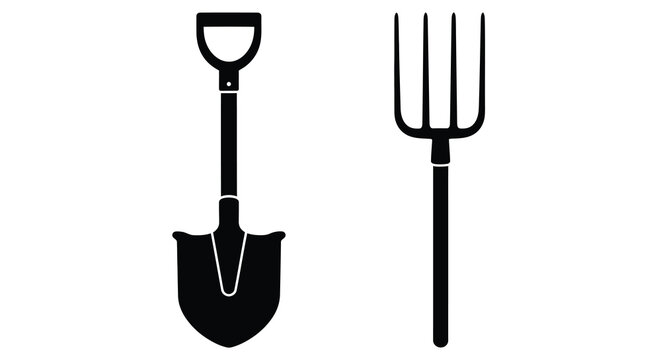 Black garden tools a spade and a pitchfork in silhouette