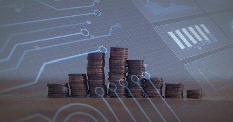 Fototapeta premium Displaying stacks of coins forming histogram on wooden tabletop, showing faint blue circuit overlay