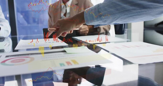 Presenter arm reaching from right, hand sliding and tapping charts, animating data showing metrics