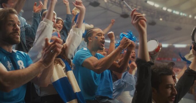 Diverse Soccer Supporters Celebrate in a Packed Stadium During a Professional League Match, With Close-up Portraits of Smiling Fans in Blue Applauding,  to a International Cup Winning Team