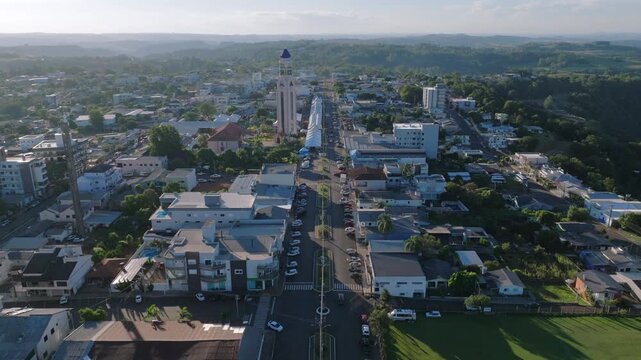 Ametista do Sul town center and church tower draw closer in a frontal aerial approach, captured in D-Log with 10-bit color using a Hasselblad sensor.