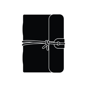 Black gift wrapped in string with tag