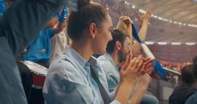 Close-up of Happy Football Supporters in a Packed Stadium. Diverse Group of Fans Celebrate Sports Team Victory at Professional World League Cup Match, Cheering From the Arena Stands