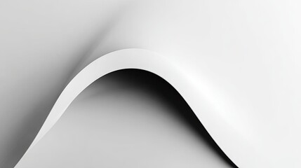 Fototapeta premium A close-up view of a curved white surface with a subtle shadow