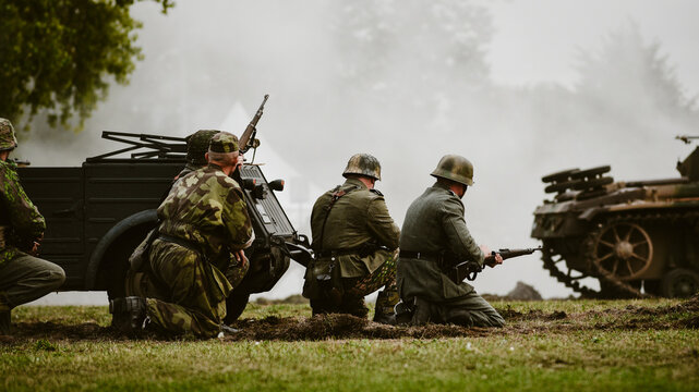Historical reenactment of World War II, the fight between the Nazis and the Poles.