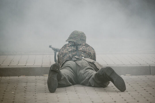 Historical reenactment of World War II, the fight between the Nazis and the Poles.
