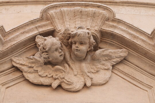 Sculpted Angels on the Facade of the Oratorio del Santissimo Sacramento al Tritone Church in Rome, Italy