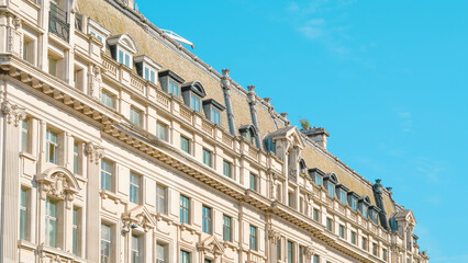 Historic European building facade with ornate architectural details and windows © Наталья Добровольска