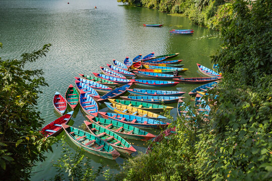Colorful boats on the lake Phewa. Pokhara, Nepal