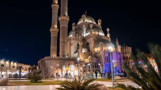 Al Sahaba Mosque in the old market of Sharm el-Sheikh, Egypt. Beautiful evening timelapse of the Al Sahaba Mosque with people walking around it in Sharm el-Sheikh.