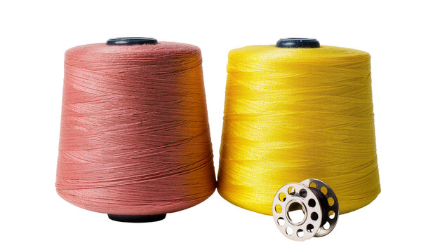Two vibrant spools of red-orange and sunny yellow sewing thread neatly positioned beside a silver bobbin, isolated on transparent background for textile design