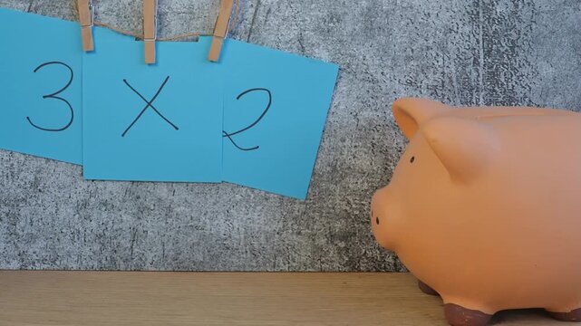 piggy bank with post-it notes, three for two offer 3x2