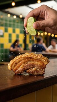 Lime Juice Splash on Crispy Torresmo Close-Up Action Shot