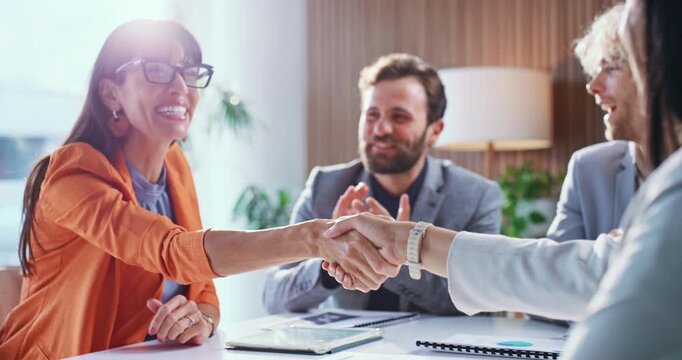 Meeting, applause or people with handshake for deal, trading partnership or success for stock acquisition. Flare, smile or broker shaking hands for investment agreement, teamwork or clap in office